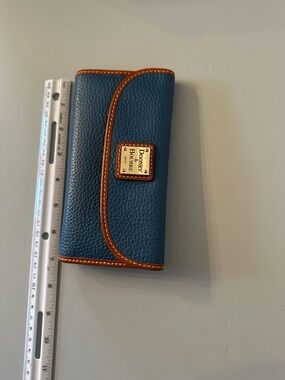 Dooney & Bourke Teal Blue Pebbled Leather Wallet with Tan Trim